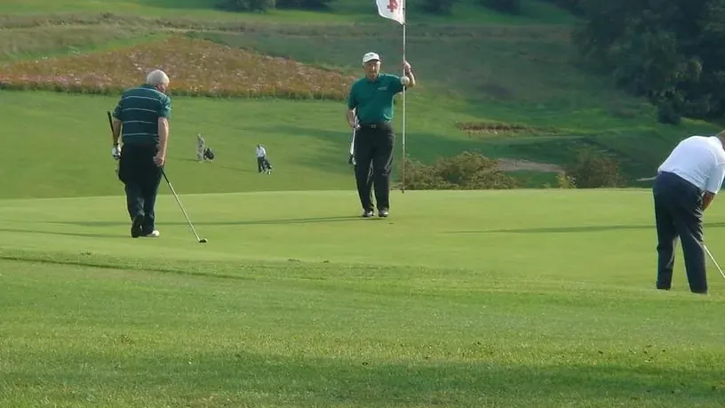Golf de Champagne — joueurs sur le green